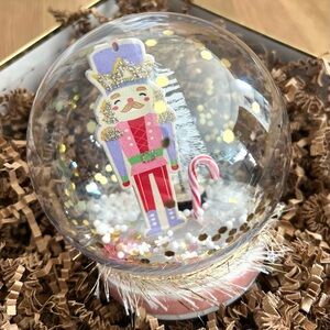Snow globe DIY Nutcracker craft kit with supplies.